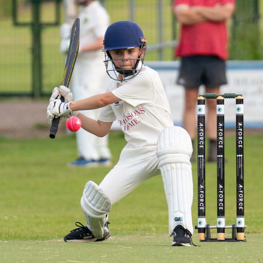 Uppingham Town Cricket Club junior in full swing with his special custom StarWars bat