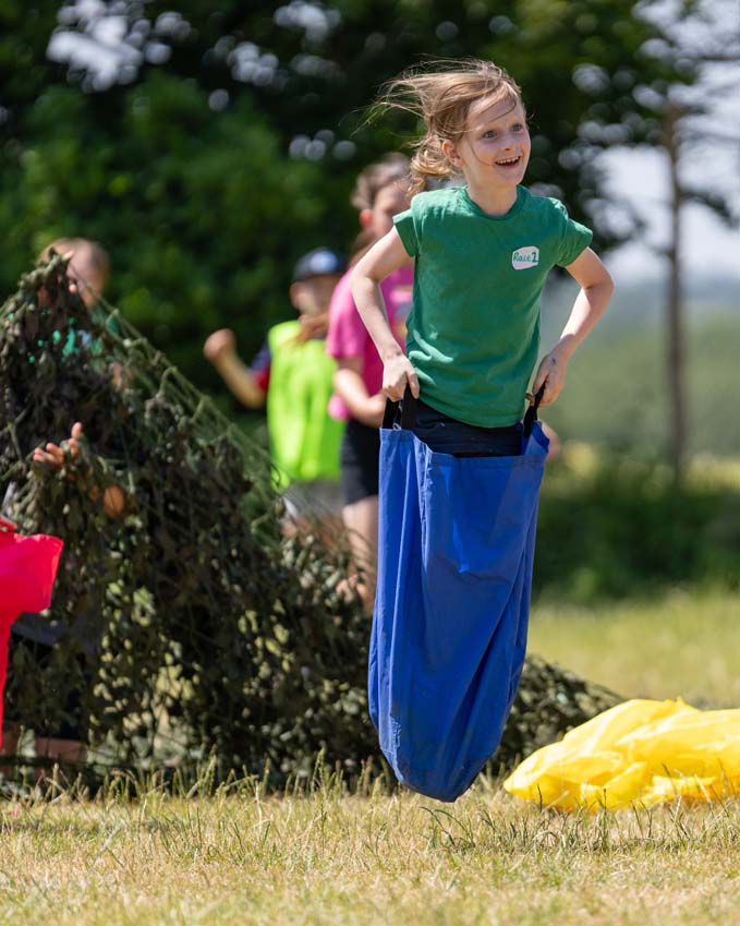 Primary school sports day girls sack race