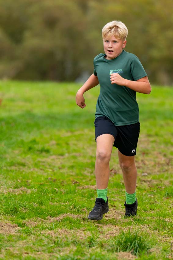 Leighfield primary school boy running at the Rutland Water cross country championships