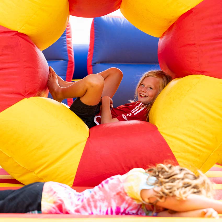 Inflatable fun on a hot day at primary school leavers party