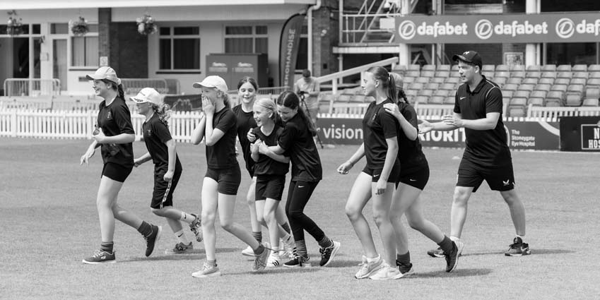SMSJ girls realise they've won the primary school county cricket championships at the Upton Steel County Ground Leicester