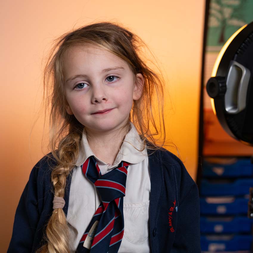 Primary school photography workshop with lighting colours chosen by the children at North Luffenham