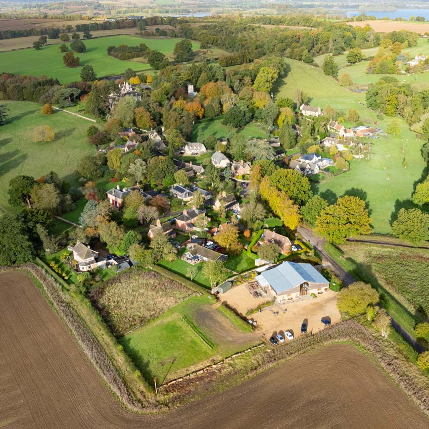 Aerial photo of Lyndon with Picks Barn in the foreground and Rutland Water in the distance