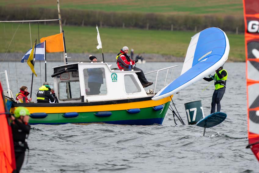 UKWA event at Rutland Water Sailing Club with a wing foiler in the midst of the action